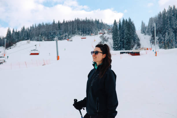 istock Woman resting after skiing 1214835639