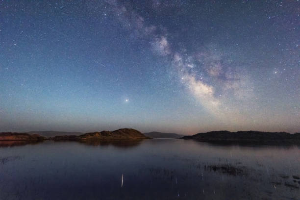 istock The Milky Way over Duolun Lake in Inner Mongolia, China 1214845726