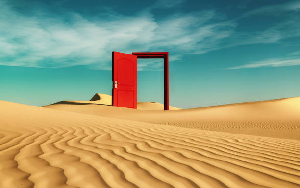 istock Opened red door in the desert . This is a 3d render illustration 1214845773