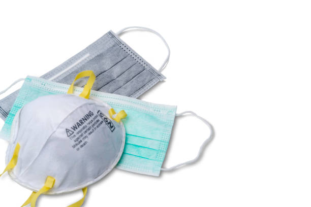istock medical face mask general, carbon and N95 type isolated on white background with clipping path, equipment for a respiratory protective select to use for airborne particles covid-19, coronavirus, pm2.5 1214850441