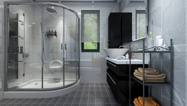 istock 3D rendering,Clean modern residential bathroom and toilet design, which is equipped with washstand, toilet and shower equipment, etc. 1214850562