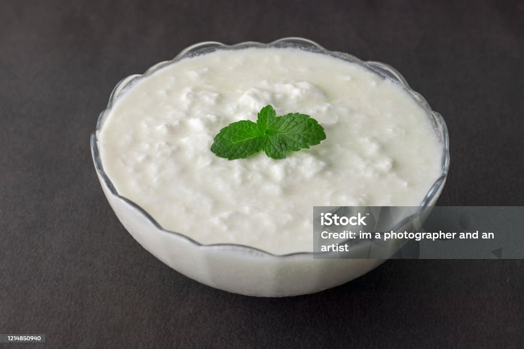 yogurt is good for health with black background Curd Cheese Stock Photo
