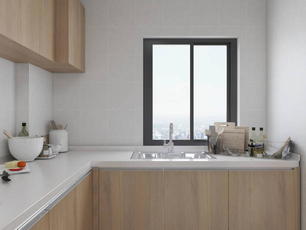 istock 3D rendering,Modern family kitchen design, new cabinets and kitchenware with refrigerators, sunlight from the window. 1214851705