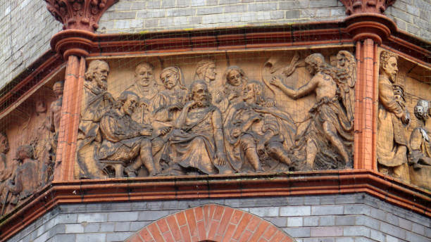 istock Stone carved figures on old Reading Town hall wall 1214854707