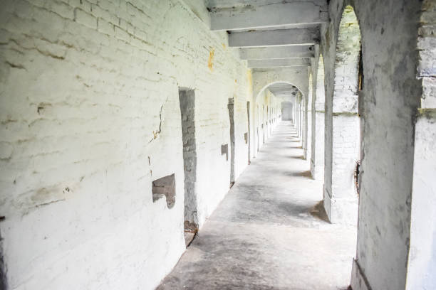 corridor of cellular jail - prison cell imagens e fotografias de stock