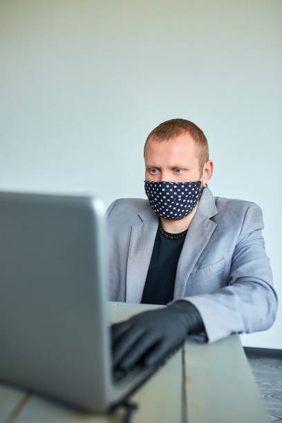 istock Man working from home because coronavirus. Business man in quarantine for coronavirus. 1214861662