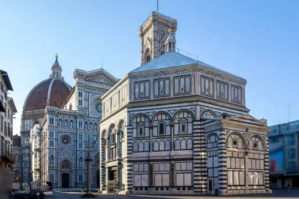 Photo of Cathedral of Santa Maria del Fiore and Baptistery of St. John Battistero of San Giovanni early morning at sunrise, Florence, Tuscany, Italy