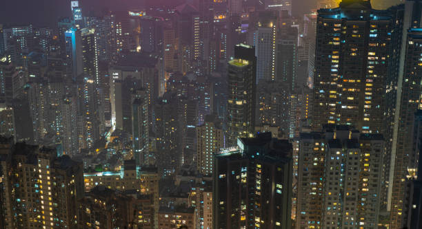 istock Buildings in Hong Kong at night 1214863219