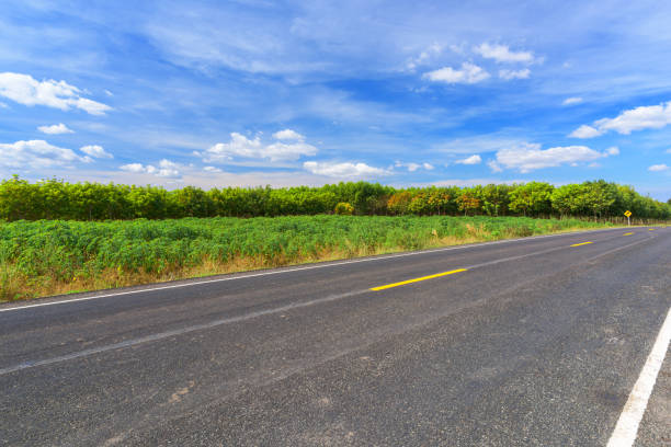 istock Asphalt road and landscape countryside with blue sky. 1214864349