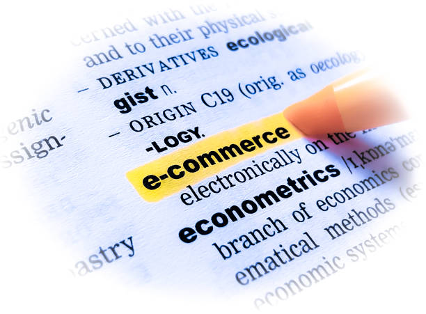 e-COMMERCE in a dictionary A close up of the word: e-COMMERCE in a dictionary, highlighted in yellow and showing part of its definition. permanent marker photos stock pictures, royalty-free photos & images