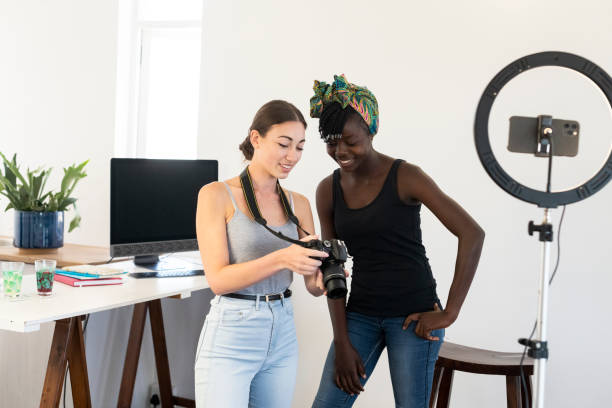 istock Young entrepreneurs in home photography studio 1214864517