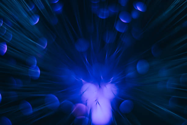 istock Beautiful optical abstract blue bokeh in the darkness background. 1214868792