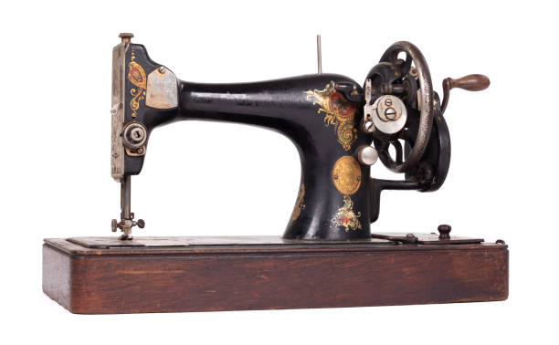 istock Antique, vintage sewing machine, isolated on white 1214869132