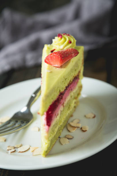 A piece of green cake on the table