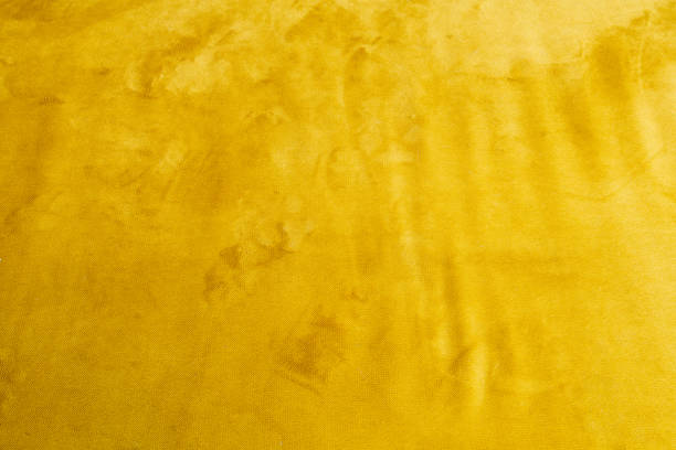 istock Abstract background with yellow texture, velvet fabric, full frame, close-up retro background texture 1214871205