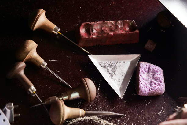 istock Close-up of a goldsmith's work table on which they are supported 1214875786