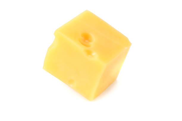 istock piece of cheese isolated on white background. top view 1214877189
