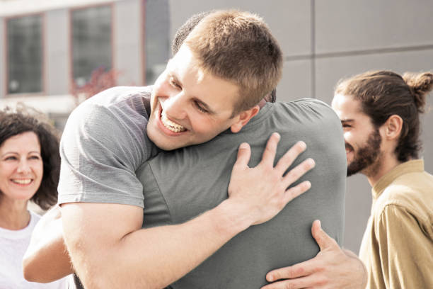 istock Multiethnic friends greeting each other 1214879695