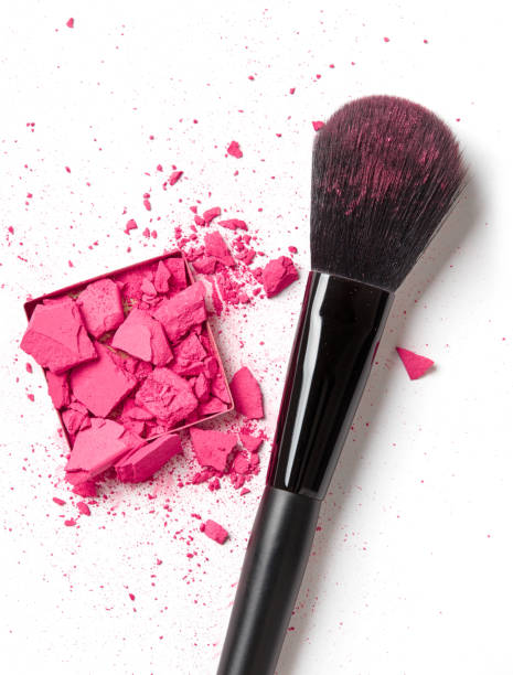 istock Crushed pink eye shadow and make-up brush 1214882182
