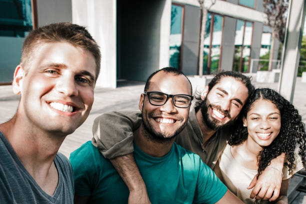 istock Content friends taking selfie outdoors 1214883103