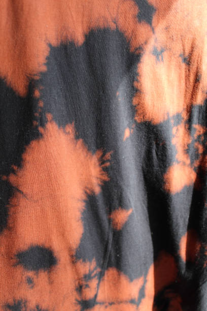istock Background, wallpaper. Space theme, fabric, black, brown, orange 1214884984