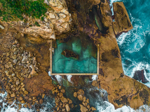 istock Curl Curl Beach Ocean Pool, Sydney Australia aerial 1214887386