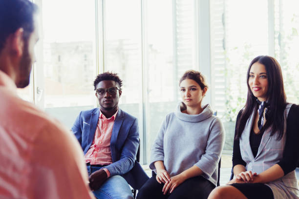 istock Business trainer instructing group of newcomers 1214887512