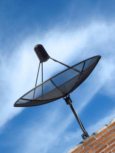 istock Sattlelite technology connect people from around the world. Sattlelite dish with blue sky background. 1214887615