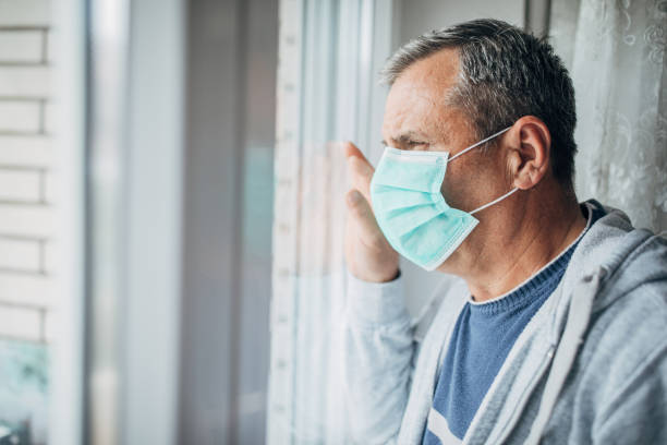 istock a man in isolation because of a virus 1214888994