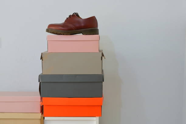 Stack of shoe boxes with copy space stock photo