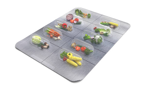 istock Natural vitamins in tablets. Fresh vegetables in a blister instead of pills. lternative medicine. Multivitamins and dietary supplements for a healthy diet. Creative concept. 3D render illustration. 1214894456