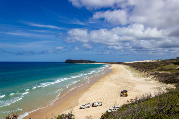 The incredible stretch of Fraser Island's sandy beach, Indian Head Lookout, Fraser Island Queensland The incredible stretch of Fraser Island's sandy beach, Indian Head Lookout, Fraser Island Queensland. fraser island stock pictures, royalty-free photos & images