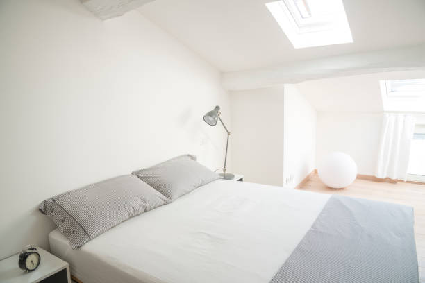 istock white design bedroom in a modern house 1214901074