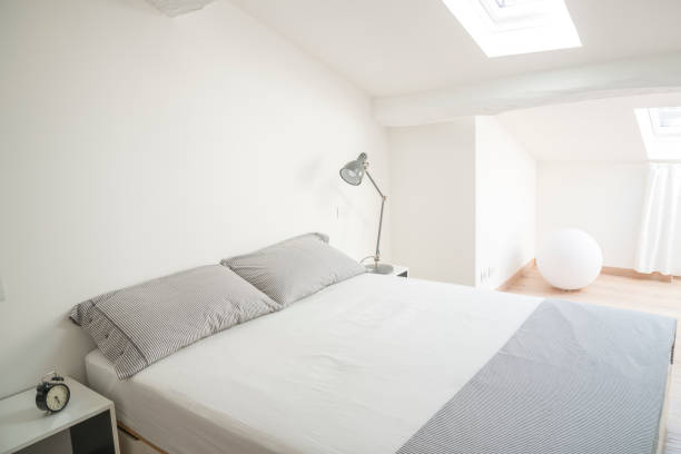 istock white design bedroom in a modern house 1214901195