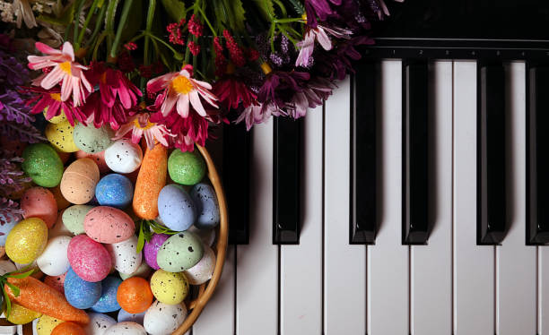 istock Paschal Easter Eggs and Piano Keys and Flowers 1214901623