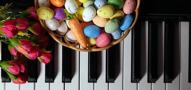 istock Paschal Easter Eggs and Piano Keys and Flowers 1214902316