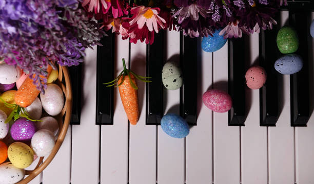 istock Paschal Easter Eggs and Piano Keys and Flowers 1214902432