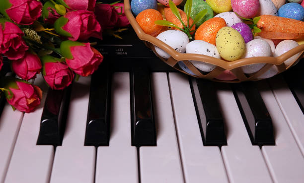 istock Paschal Easter Eggs and Piano Keys and Flowers 1214902599