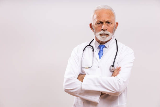 Angry senior doctor stock photo