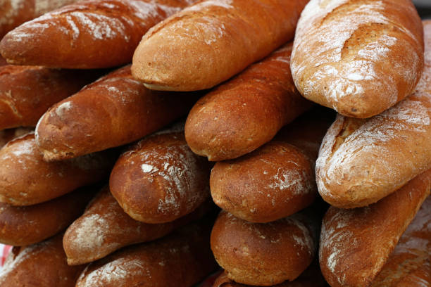 istock Fresh French baguette bread on retail display 1214904068