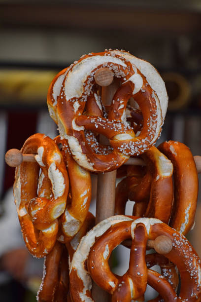 istock Close up pretzel bread hanging on retail display 1214905014