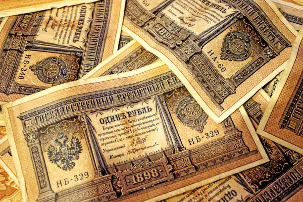 Photo of Old Russian tsarist paper money. Beautiful retro background with 1 ruble bills.