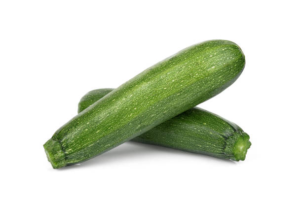 istock fresh green zucchini isolated on white background 1214908914