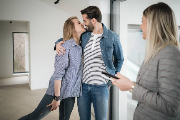 istock The couple congratulate each other on buying a house 1214911330