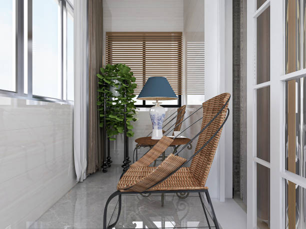 istock 3D rendering, spacious and bright urban residential closed balcony design, green plants with wooden tables and chairs are leisure and comfortable. 1214912174