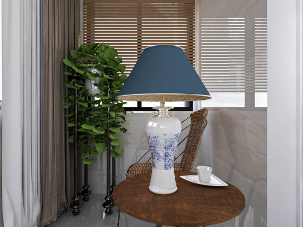 istock 3D rendering, spacious and bright urban residential closed balcony design, green plants with wooden tables and chairs are leisure and comfortable. 1214912186