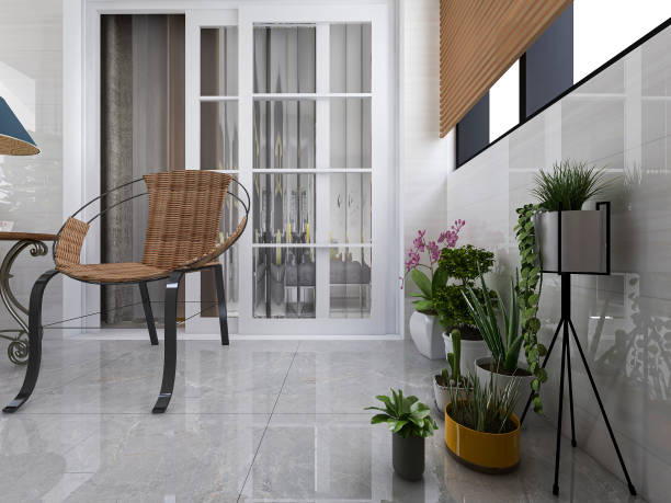 istock 3D rendering, spacious and bright urban residential closed balcony design, green plants with wooden tables and chairs are leisure and comfortable. 1214912190