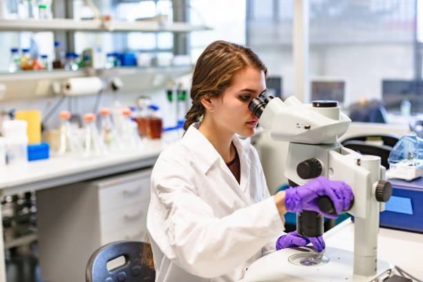 istock Scientist conducts study of biological material in lab 1214913505