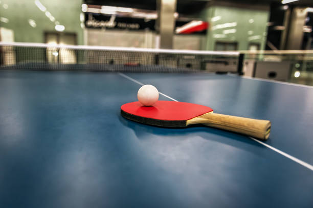 istock tennis racket and ball on the table 1214914933