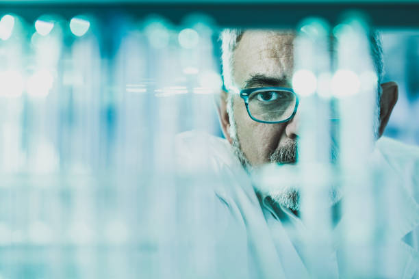 istock Close up of a senior scientist working in laboratory. 1214917115